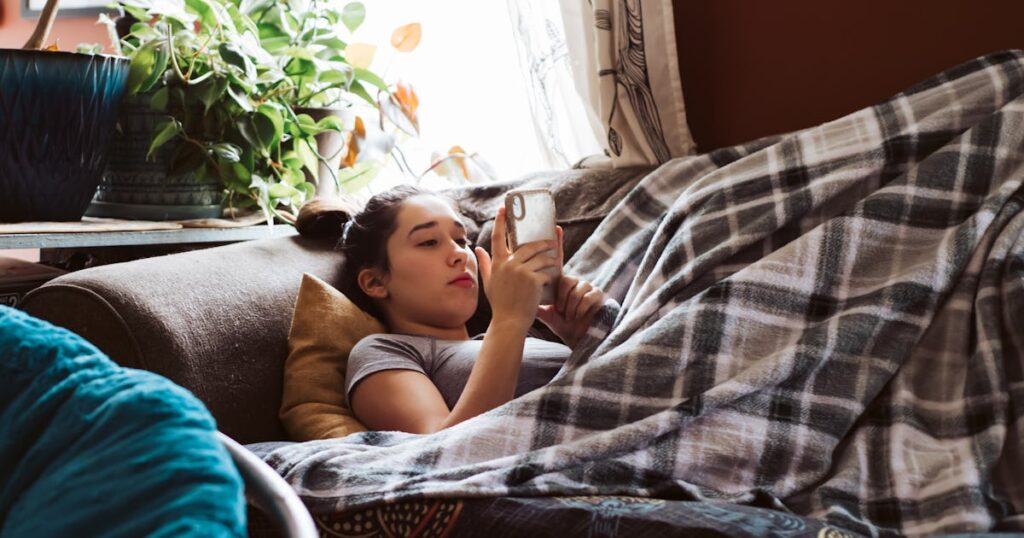 teenage child lying on