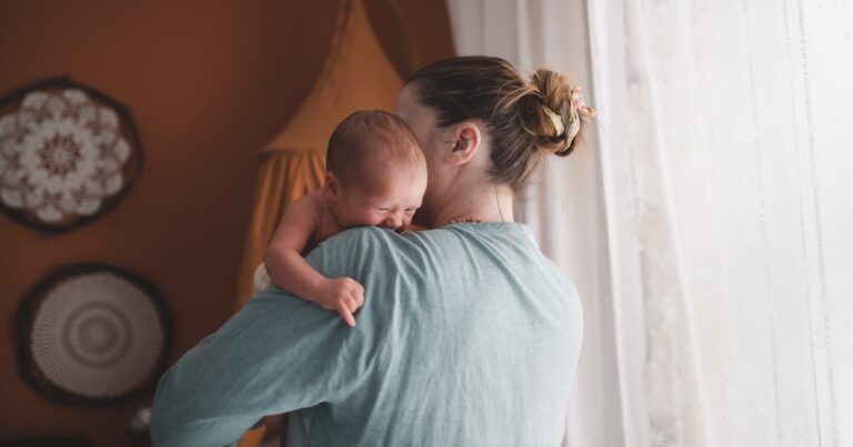 mother with crying newborn