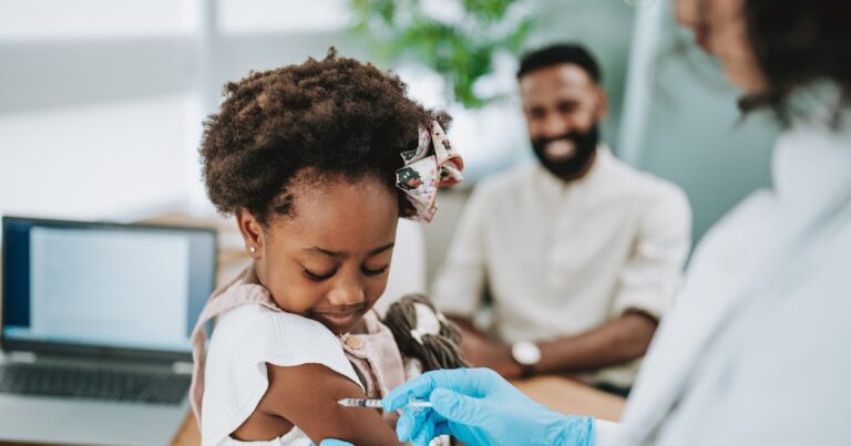 child being vaccinated